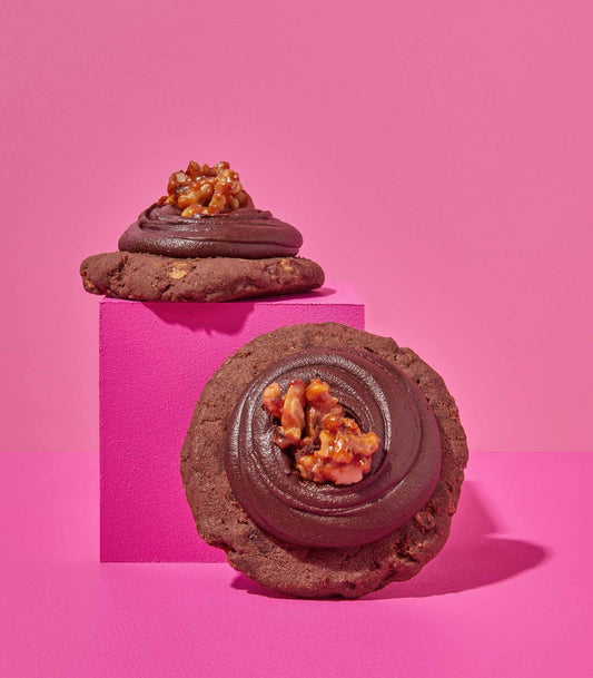 DOE Donuts afghan cookies stacked on a pink cube
