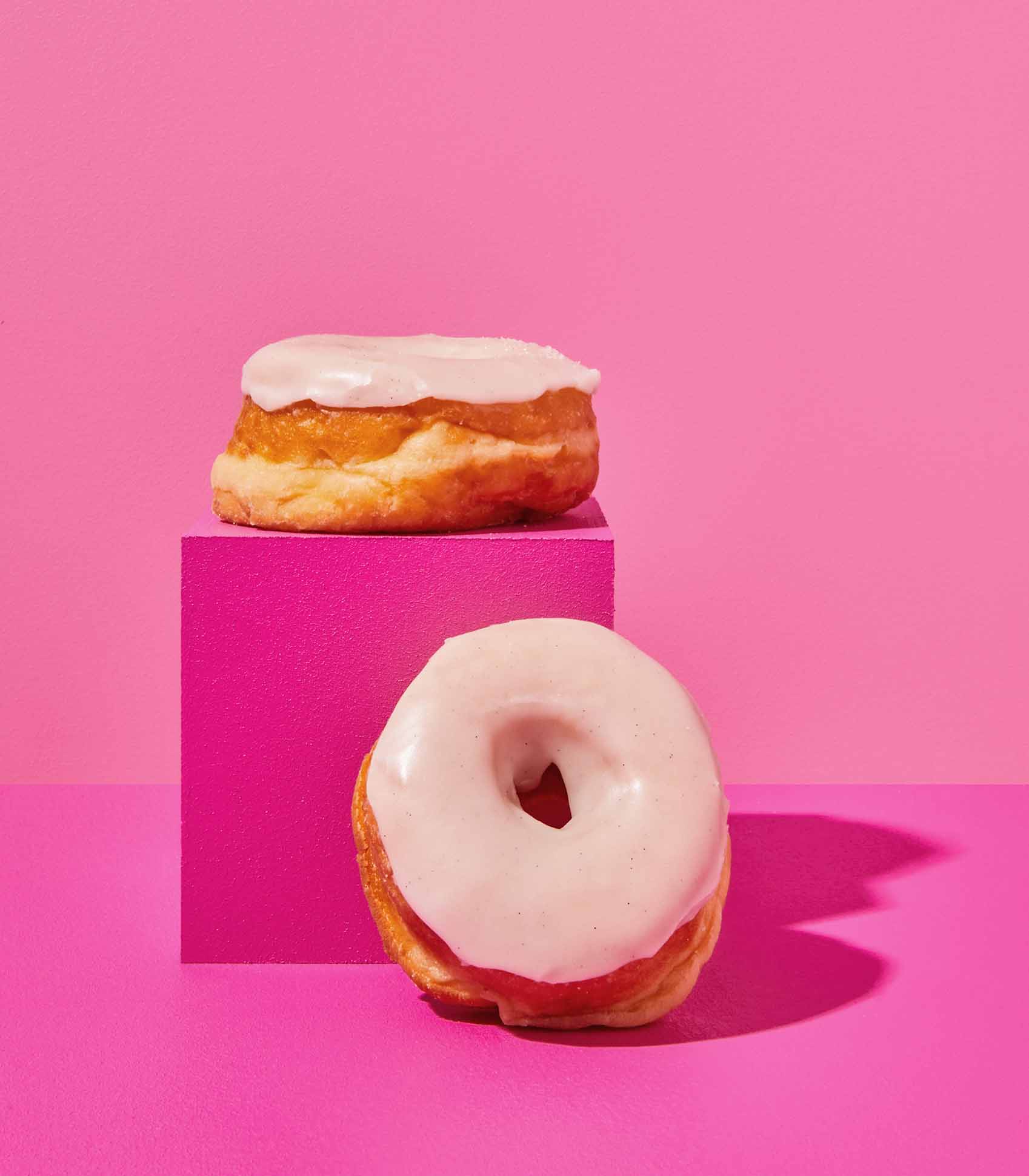 DOE Donuts stacked on a pink cube Vanilla Glaze Core Flavour