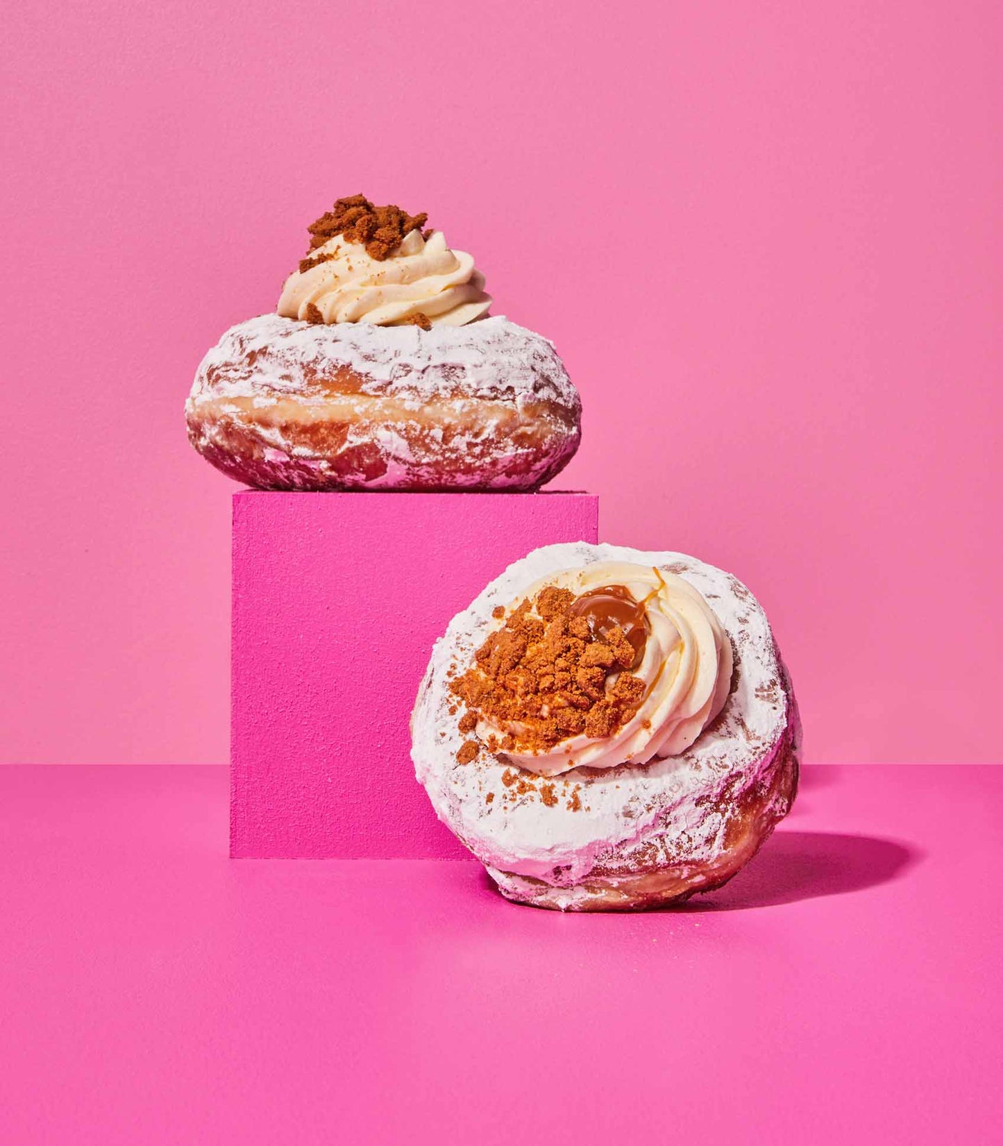 DOE Donuts weekly special Banoffee Pie flavour stacked on pink cubes