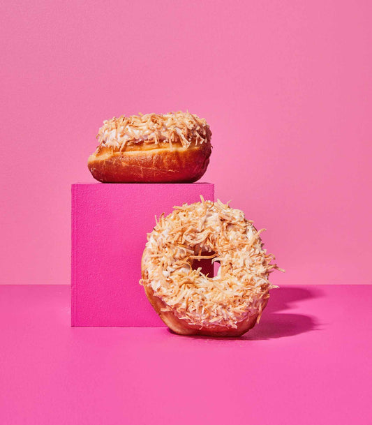 DOE Donuts 2 on pink cubes weekly special Coconut Bun flavour